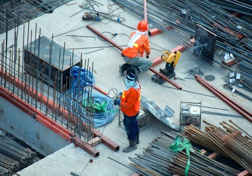 A crew working together on a reinforced concrete job site